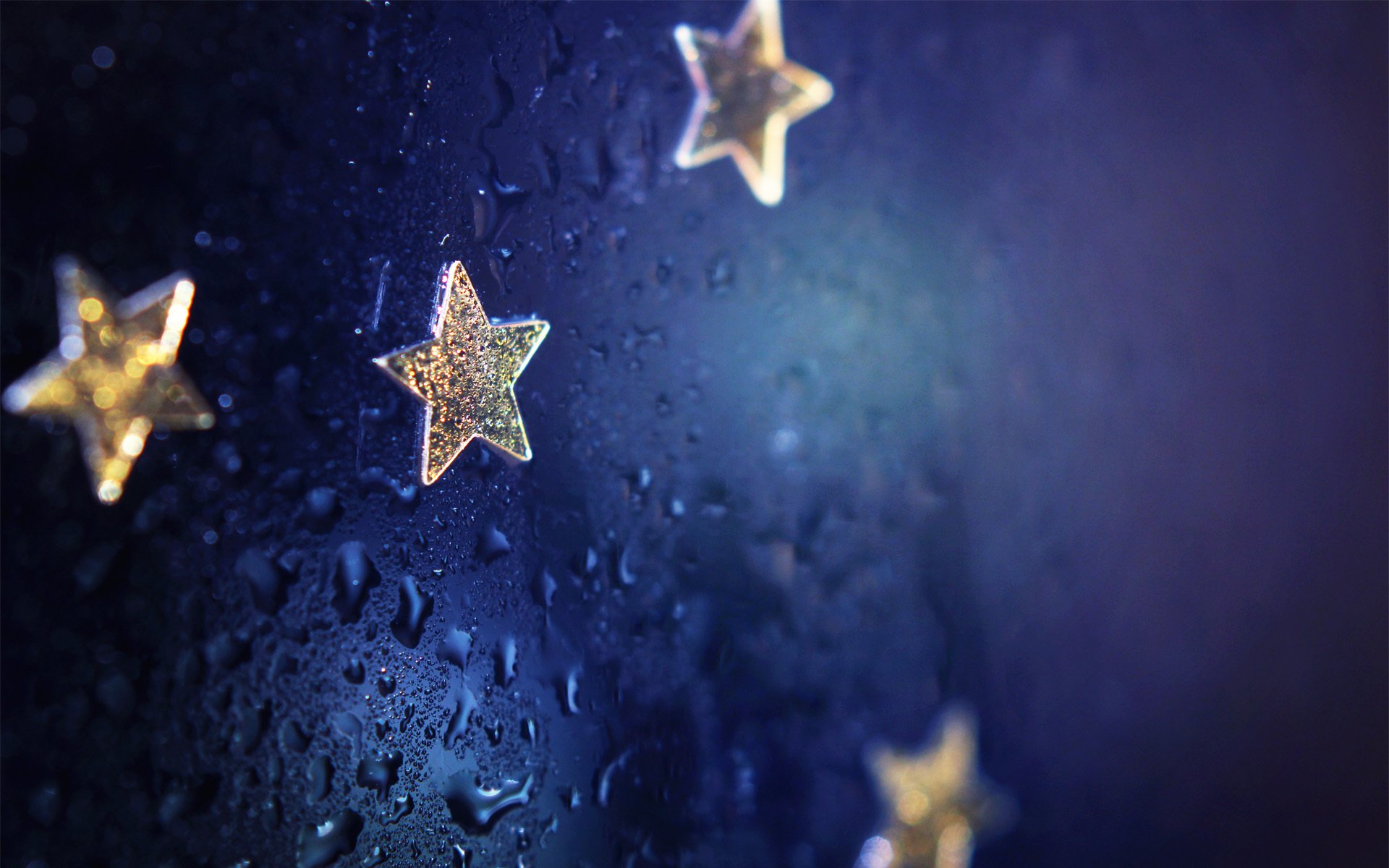 fondo azul estrellas gotas enfoque