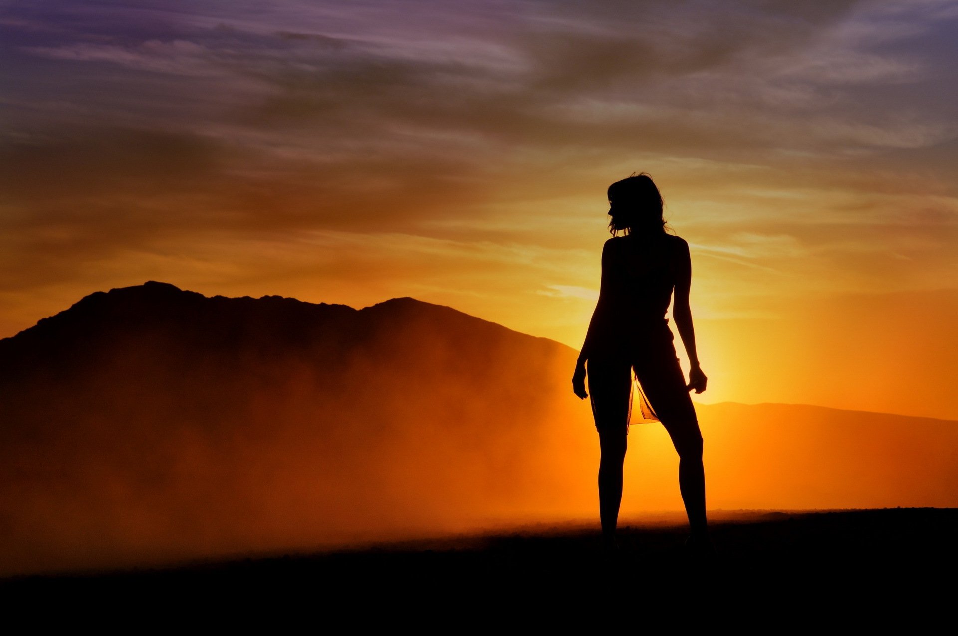 unset silhouette girl light flowers background