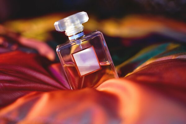 A bottle of women s perfume on the fabric