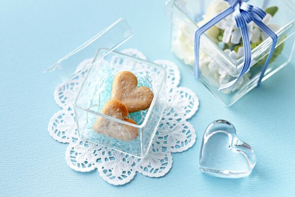 Cookies in the shape of hearts in a transparent box