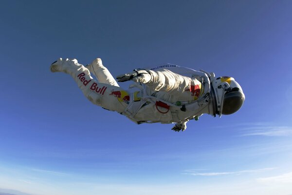 Parachutist in a spacesuit in free flight