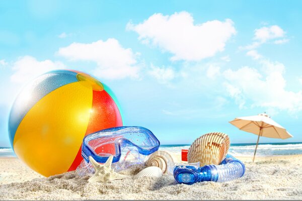 Spiaggia, con accessori da spiaggia occhiali palla e ombrello