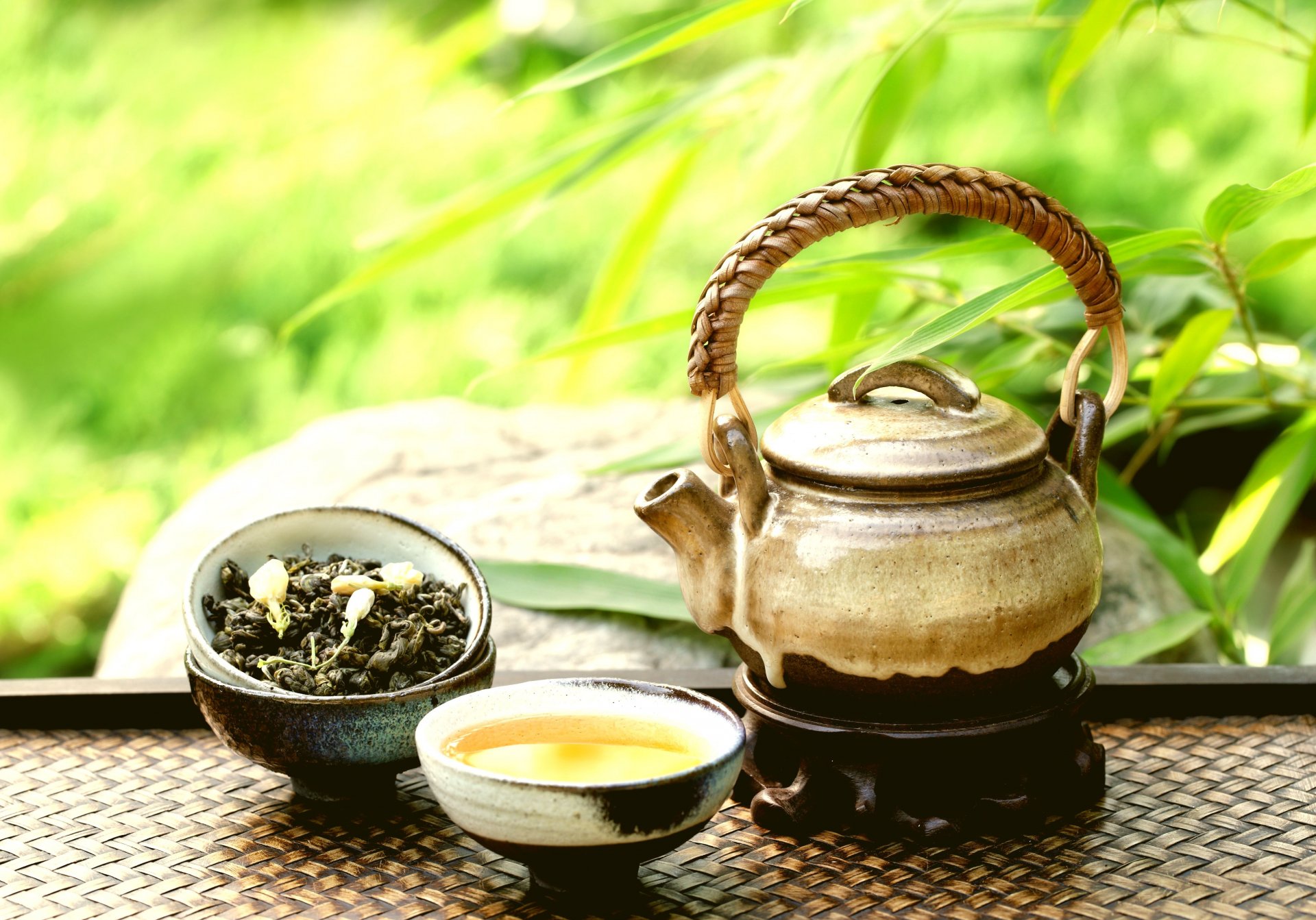 teapot and cups on stone still life clay kettle cups additives petals fragrance east tea ceremony