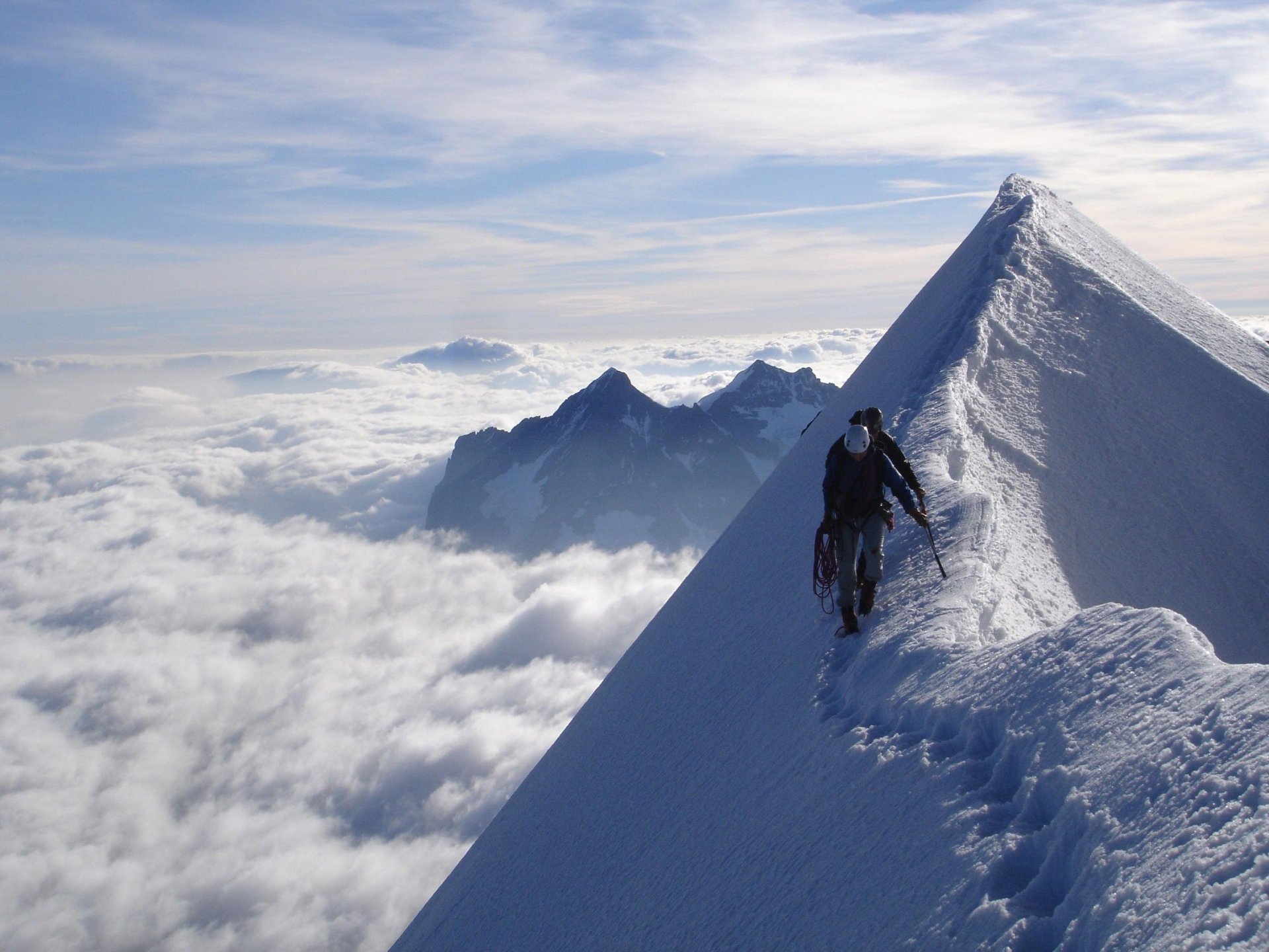 mountain snow clouds sky people next summit