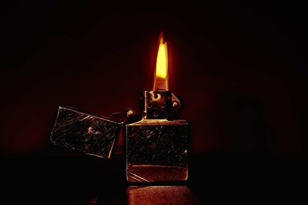 Scratched zippo lighter with flame