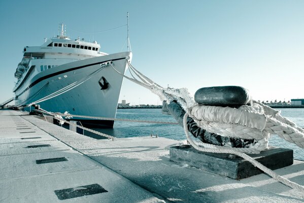 The guard on the pier in gray- blue color