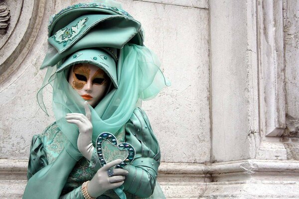 A girl in Venice dressed in a masquerade to go to a ball