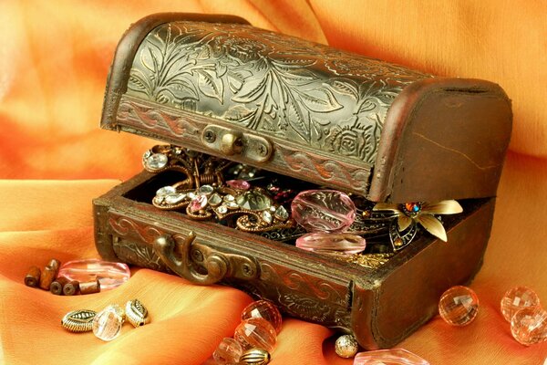 Jewelry box on a satin tablecloth