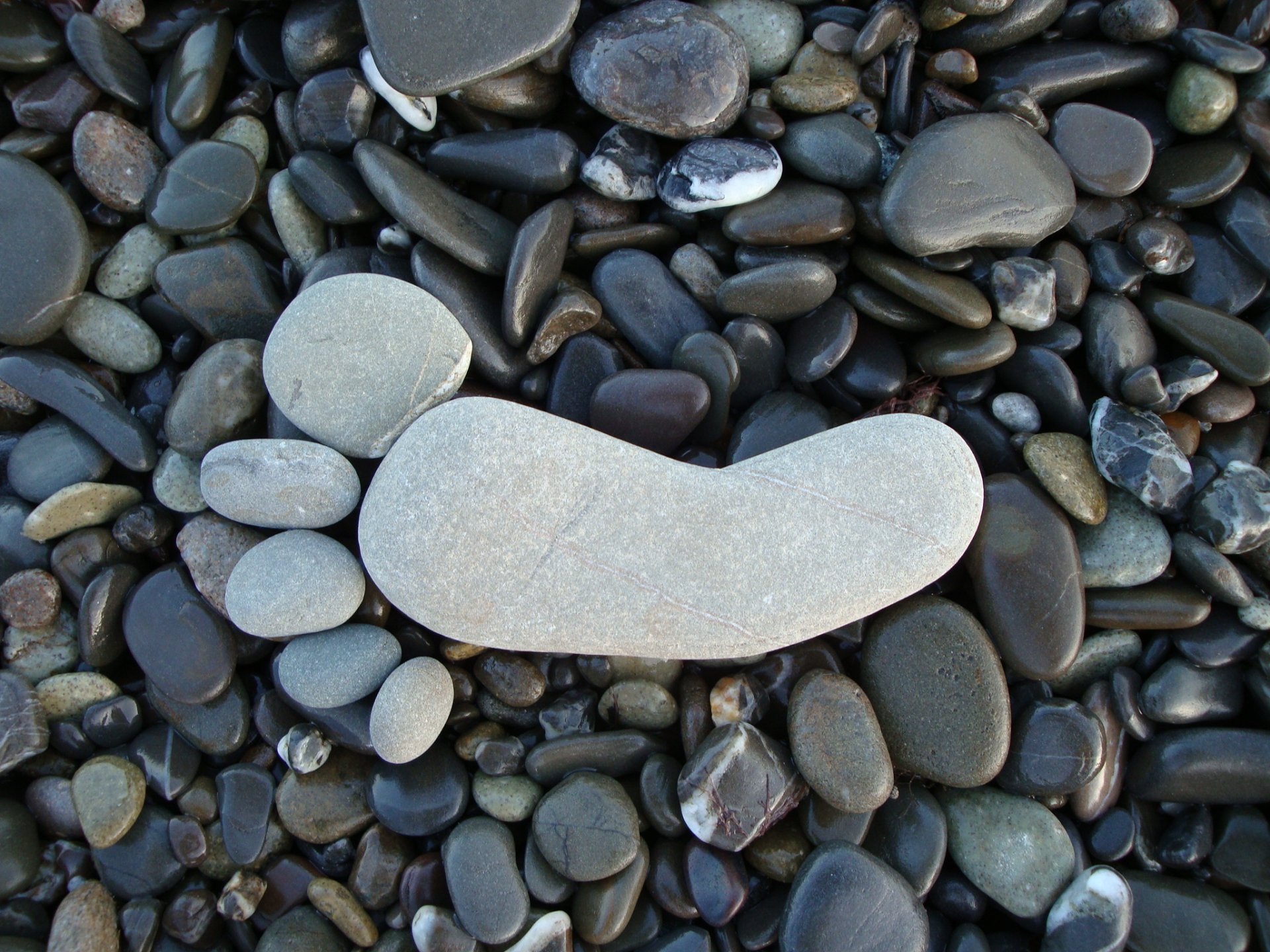 pebbles stones foot