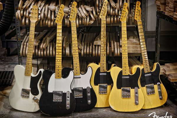 Guitars in black, yellow, white