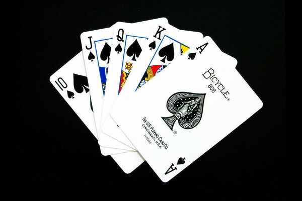 Poker four black cards of the suit