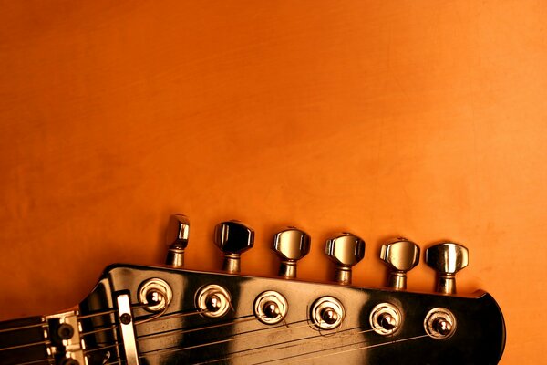 An image of a guitar on which the strings are visible