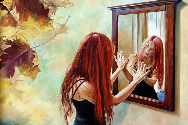 Long-haired red-haired girl looks at herself in the mirror