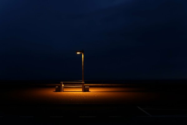 Dark night lantern and bench