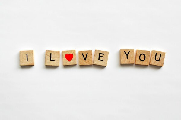 Wooden bones with an inscription and a heart