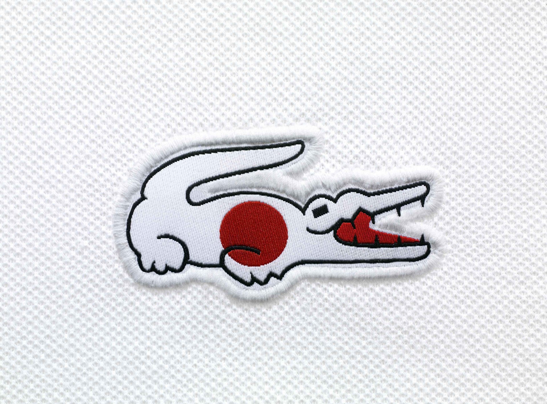 lacoste japón bandera cocodrilo