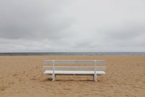 Bench on the beach by the sea