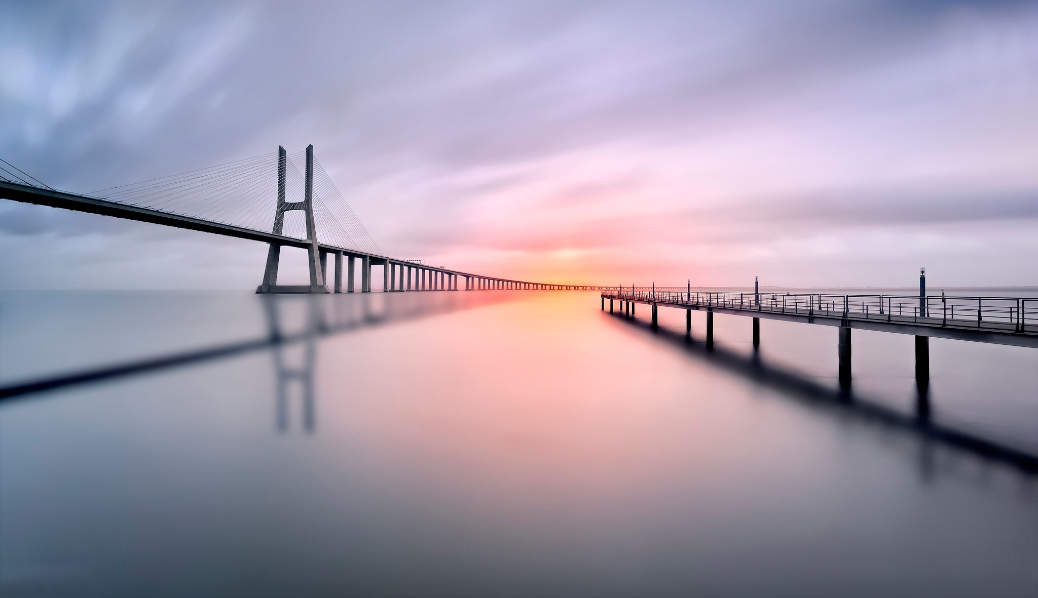 bridge vasco da gama pier reflection