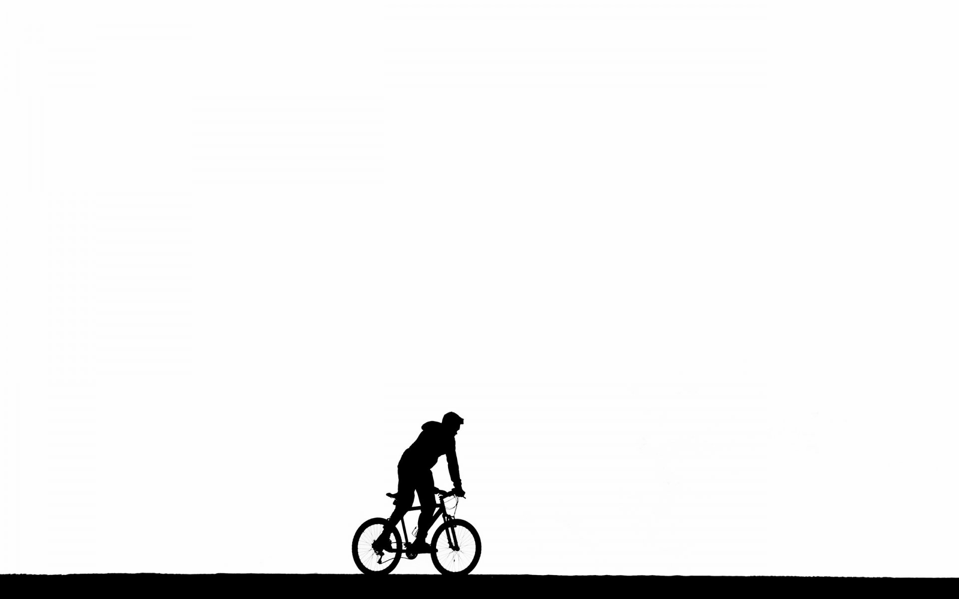 uomo bicicletta minimalismo