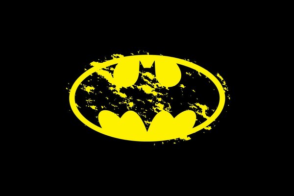 Yellow Batman logo on black background