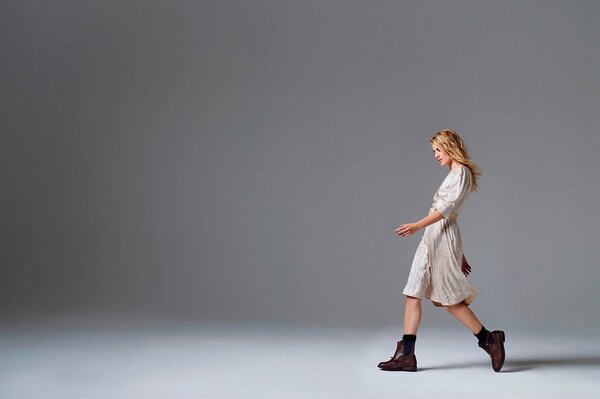 The gait of Melanie Laurent in a malam figaro dress