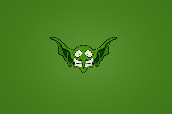 Smiling goblin on a green background