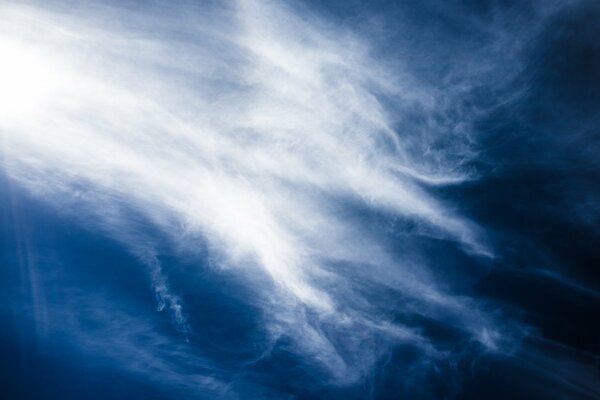 Cirrus-layered white clouds