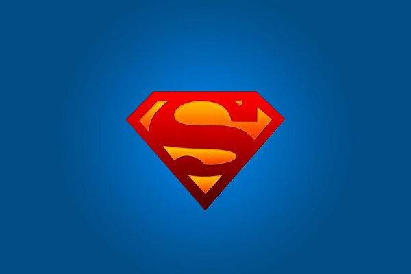 El logotipo de Superman de los super héroes sobre un fondo azul