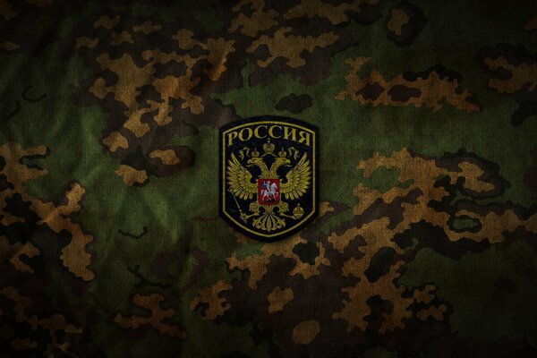 A patch on a military uniform with the symbols of the Russian Federation