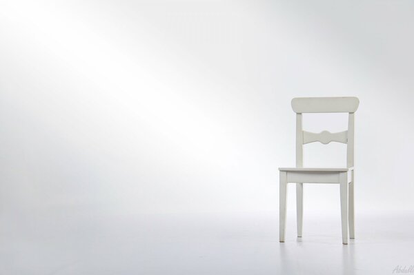 White chair in 3-D model on a white background