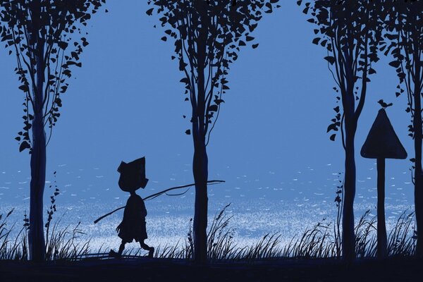 A boy with a fishing rod in the forest at dawn