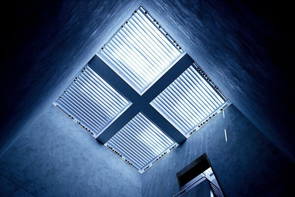 Light through the bars of the windows in the ceiling