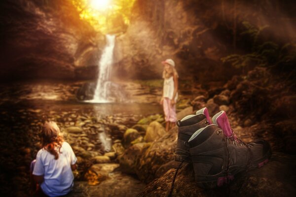 Children at the waterfall with light processing