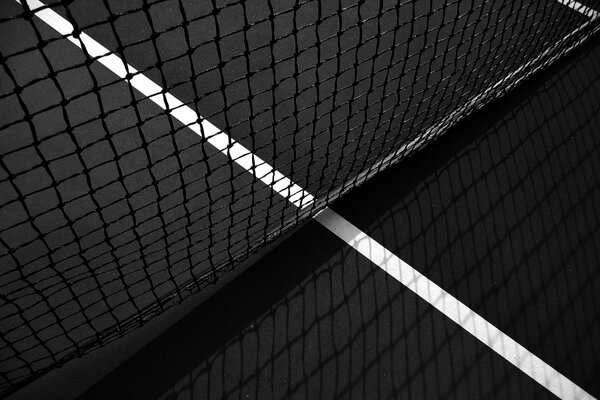 Photo noir et blanc d un filet de tennis