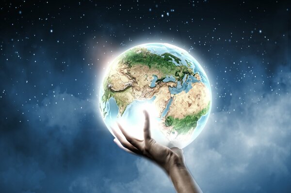 The palm holding the whole planet