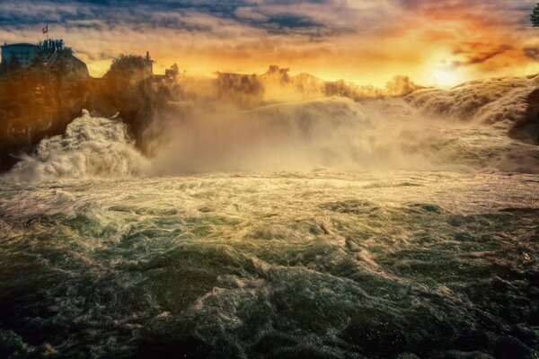 The rapid flow of the river at sunset