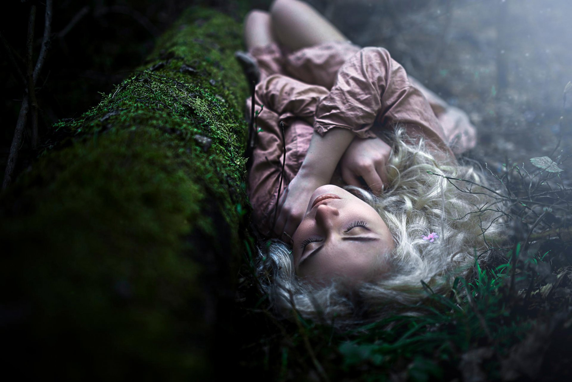 blond girl forest sleeping