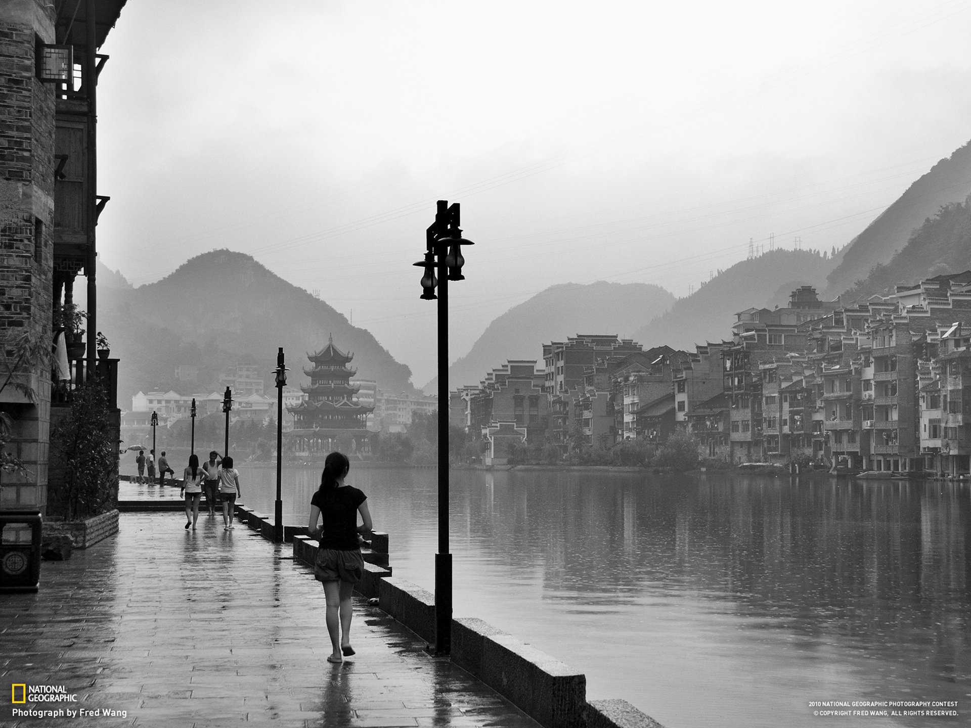 fred wang national geographic china girl rain river hill houses black and white