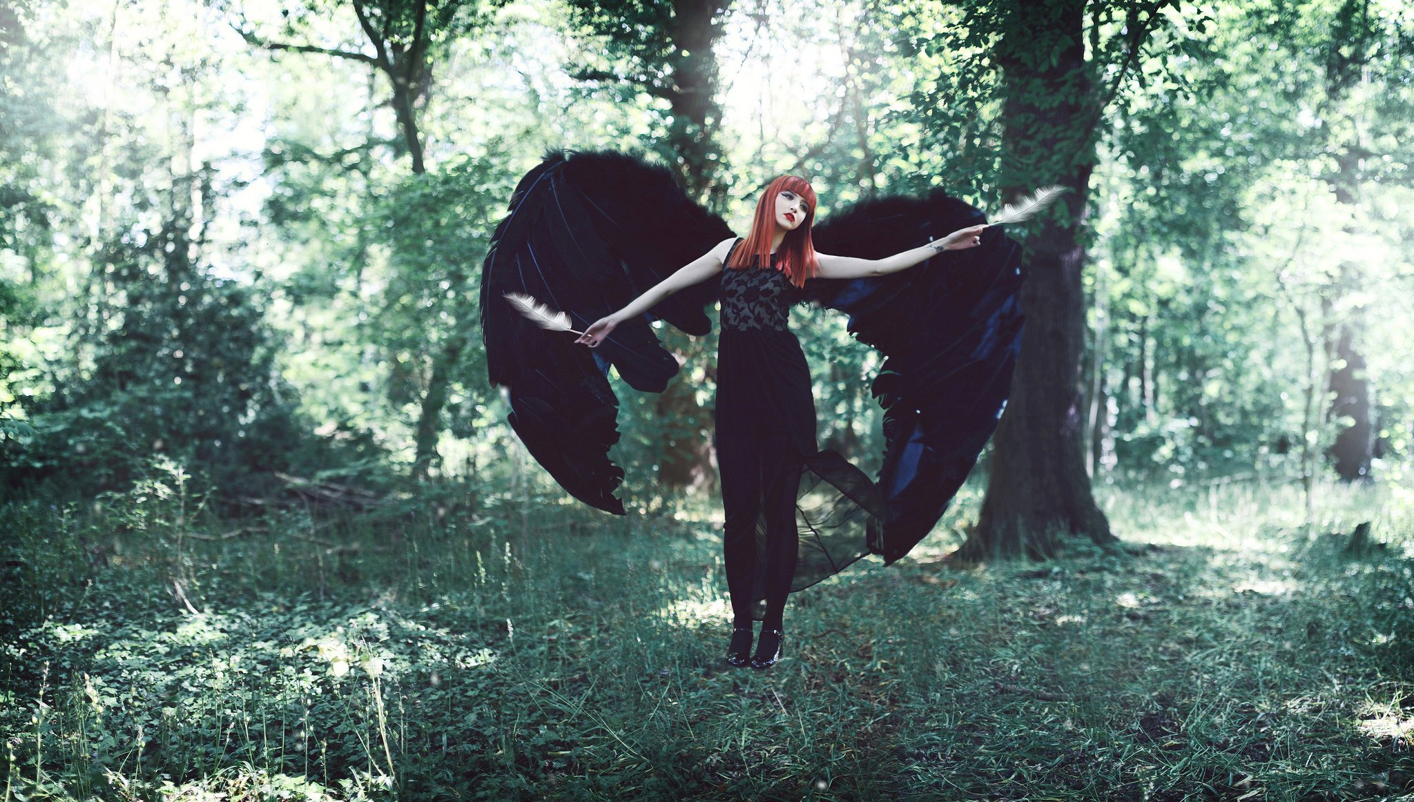 red-haired girl wings feather