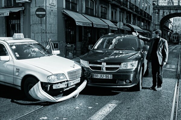 An accident in the city. Taxi. Narrow streets of the city