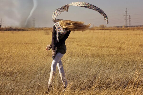 Girl dancing with a tornado