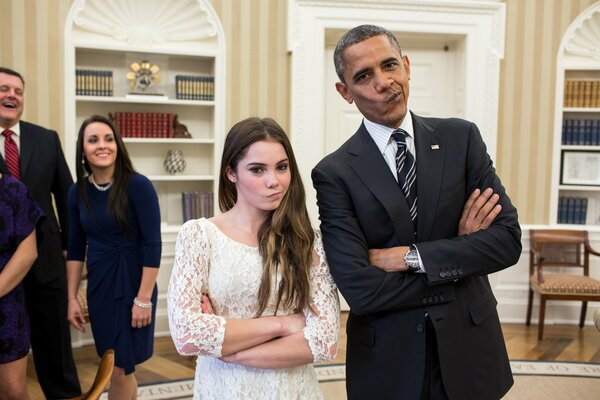 Barack Obama and the girl make faces