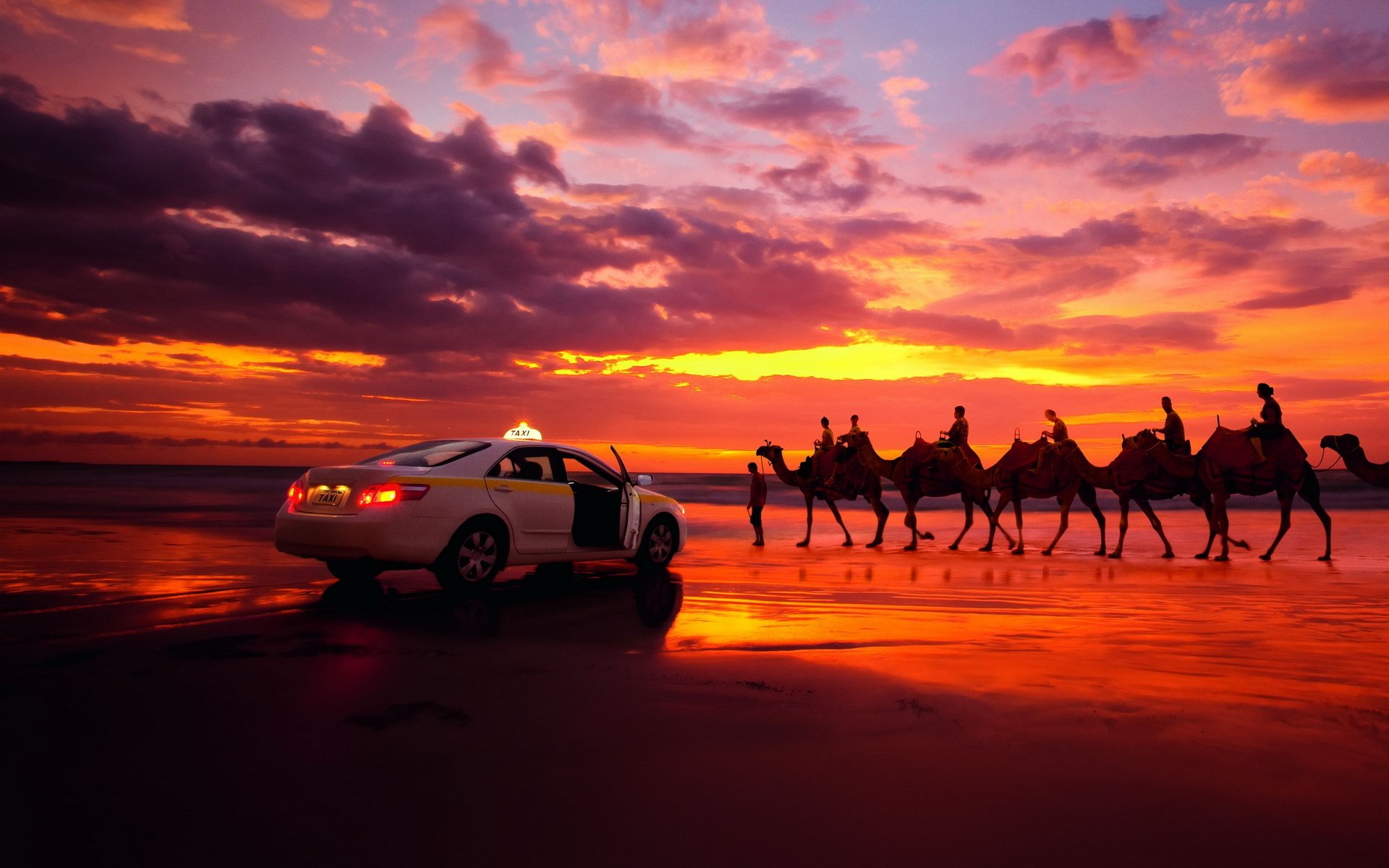 taxi caravan sunset clouds desert