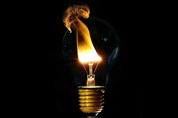 The fire in the lamp is a reference to the history of electricity