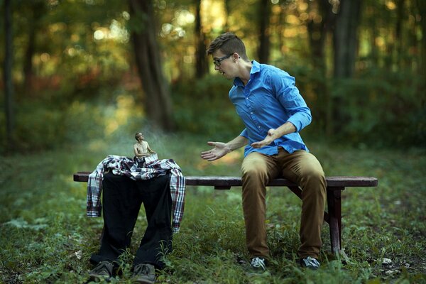 The situation with men sitting on a bench in the park