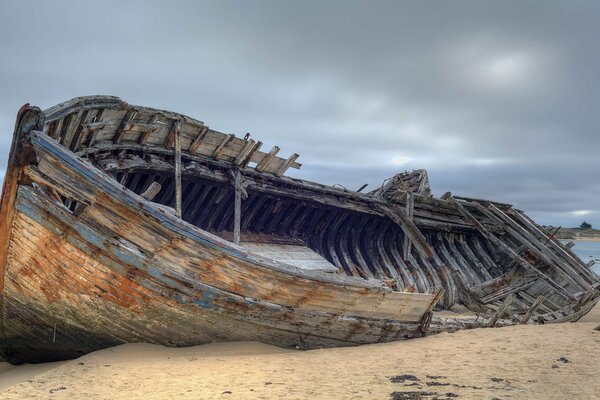 The remains of a ship on the seashore