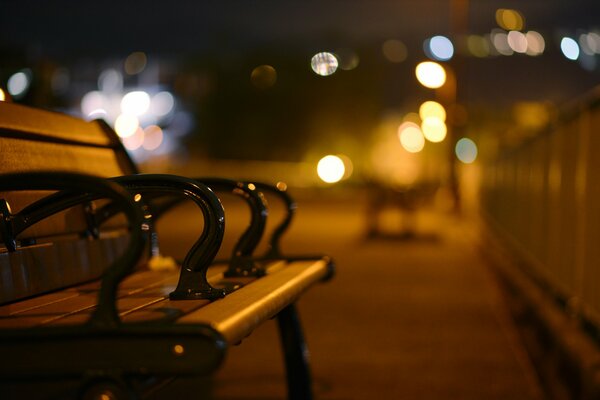 A blurred bench on the street in the park