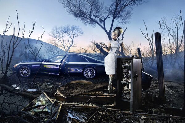 A girl in an abandoned building with a car