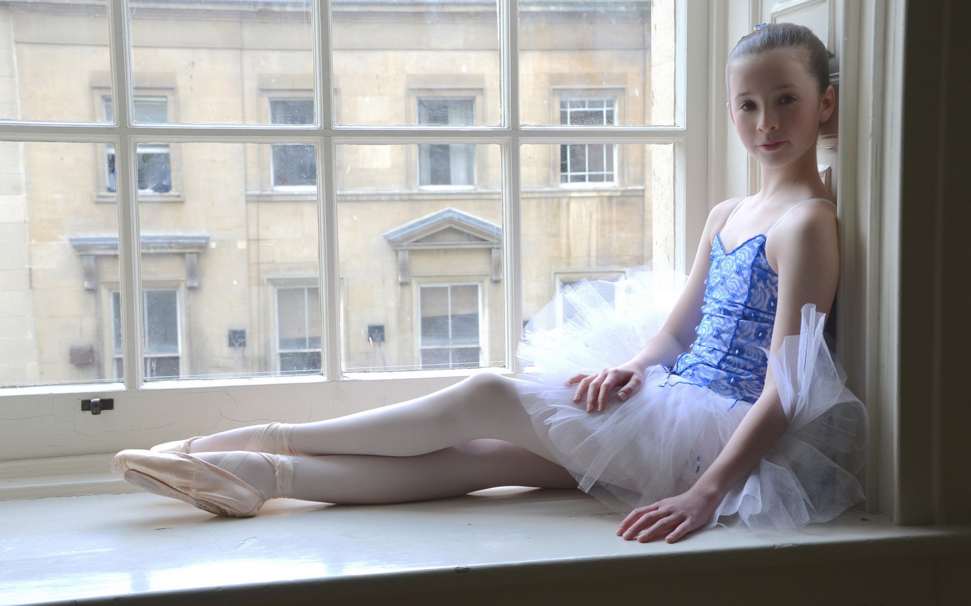 girl ballerina window