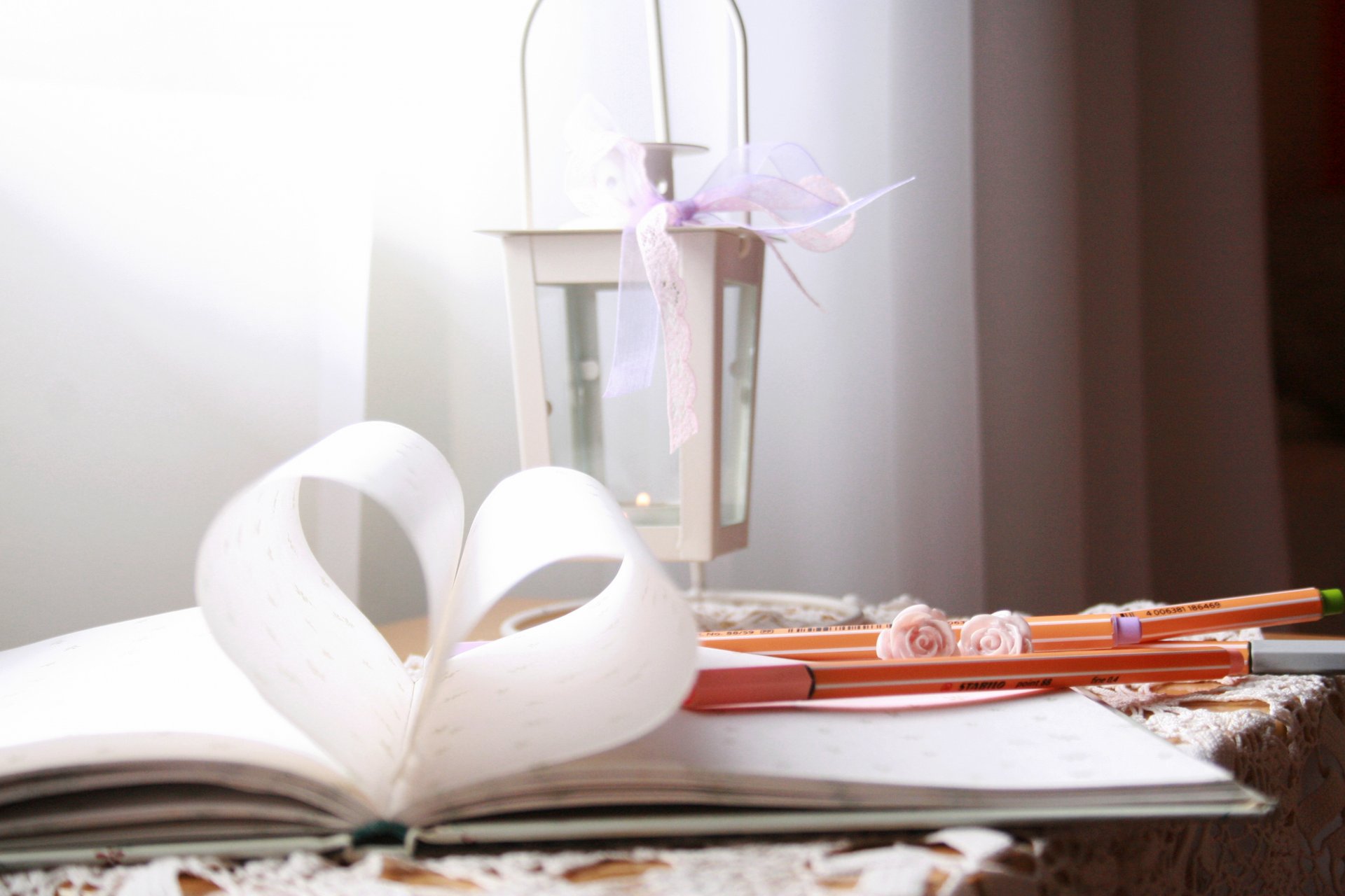 book heart pages marker pens flashlight candle